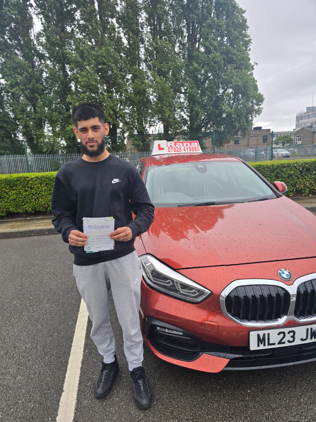 Successful student with driving pass certificate