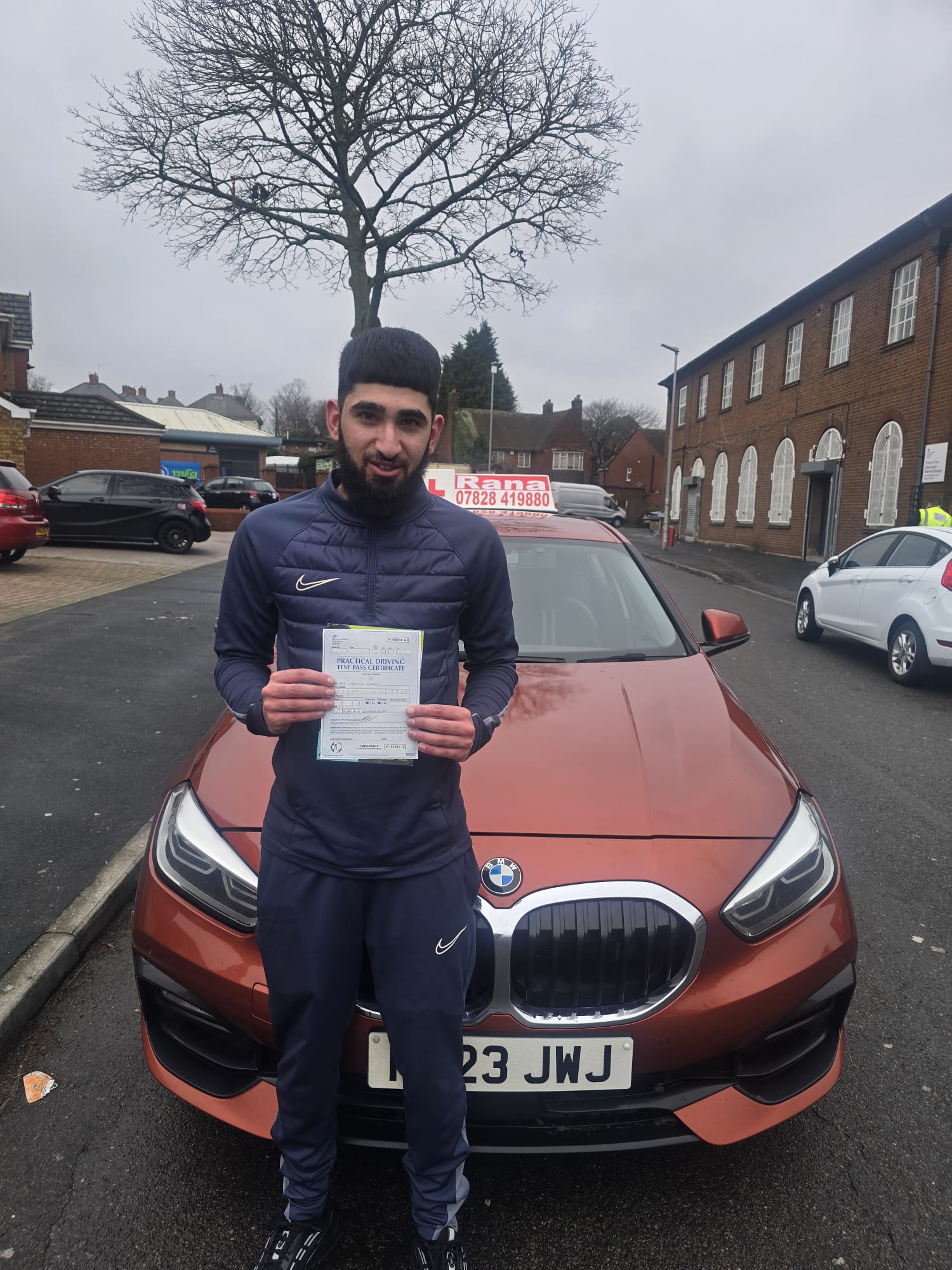 Successful student with driving pass certificate