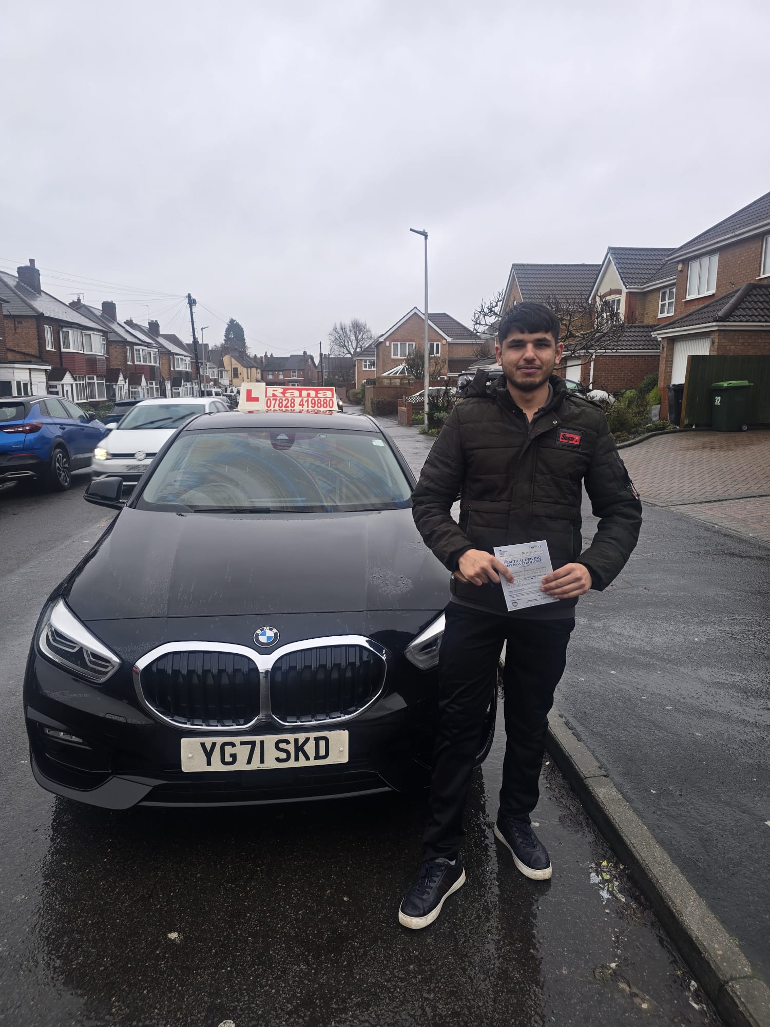 Successful student with driving pass certificate