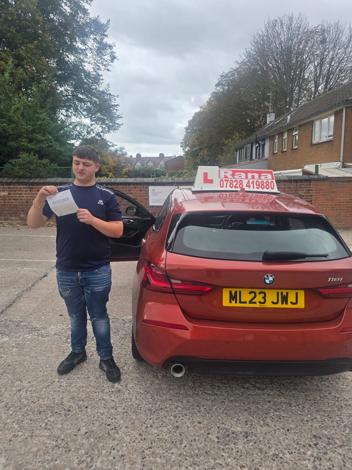 Successful student with driving pass certificate