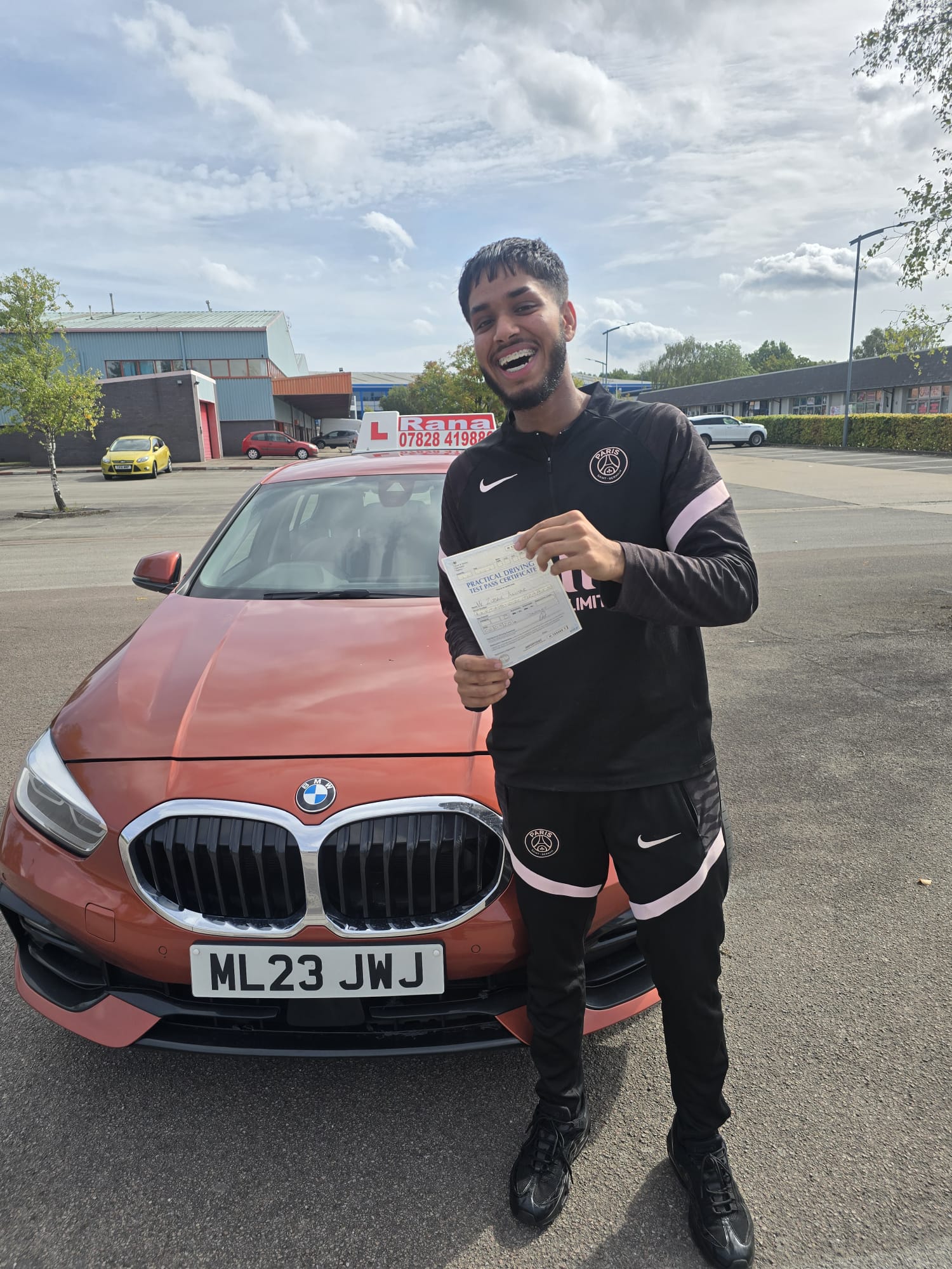 Successful student with driving pass certificate