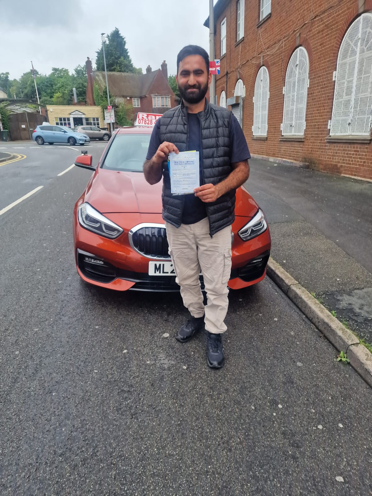 Successful student with driving pass certificate