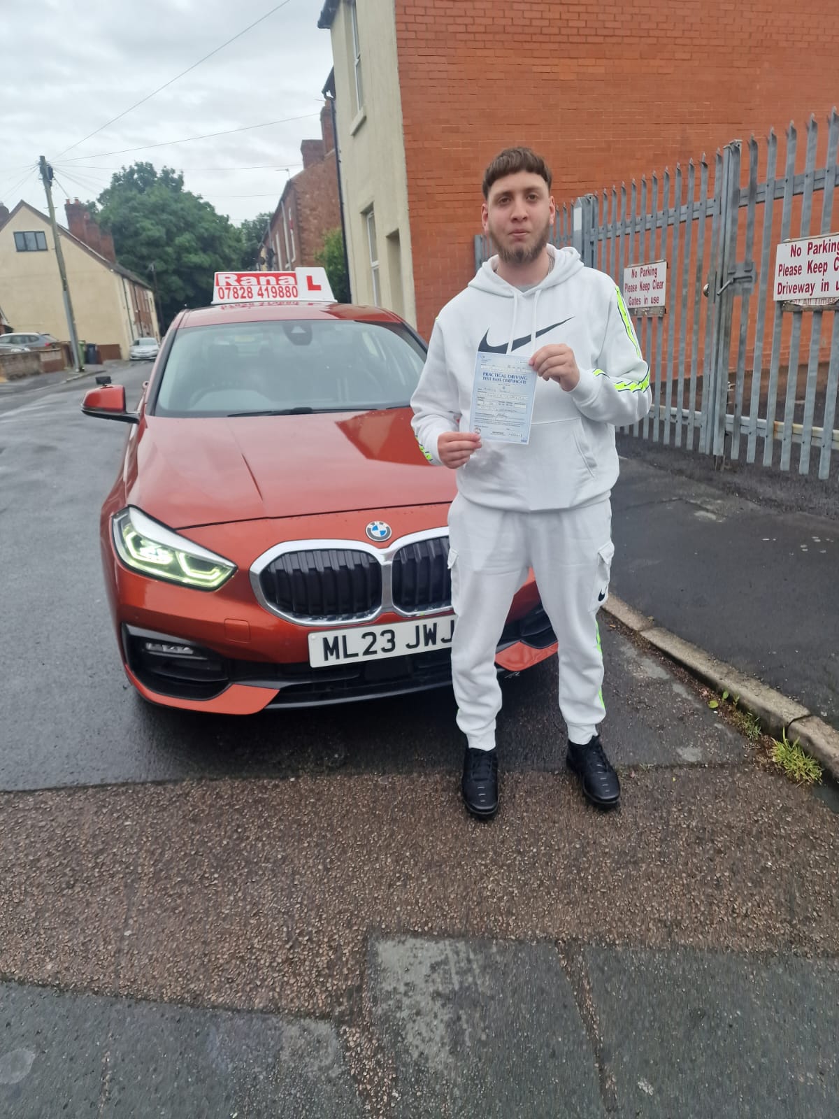 Successful student with driving pass certificate