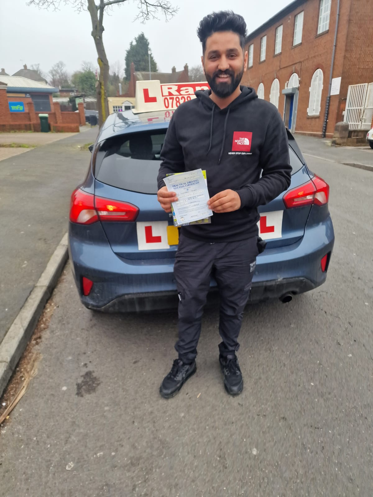 Successful student with driving pass certificate