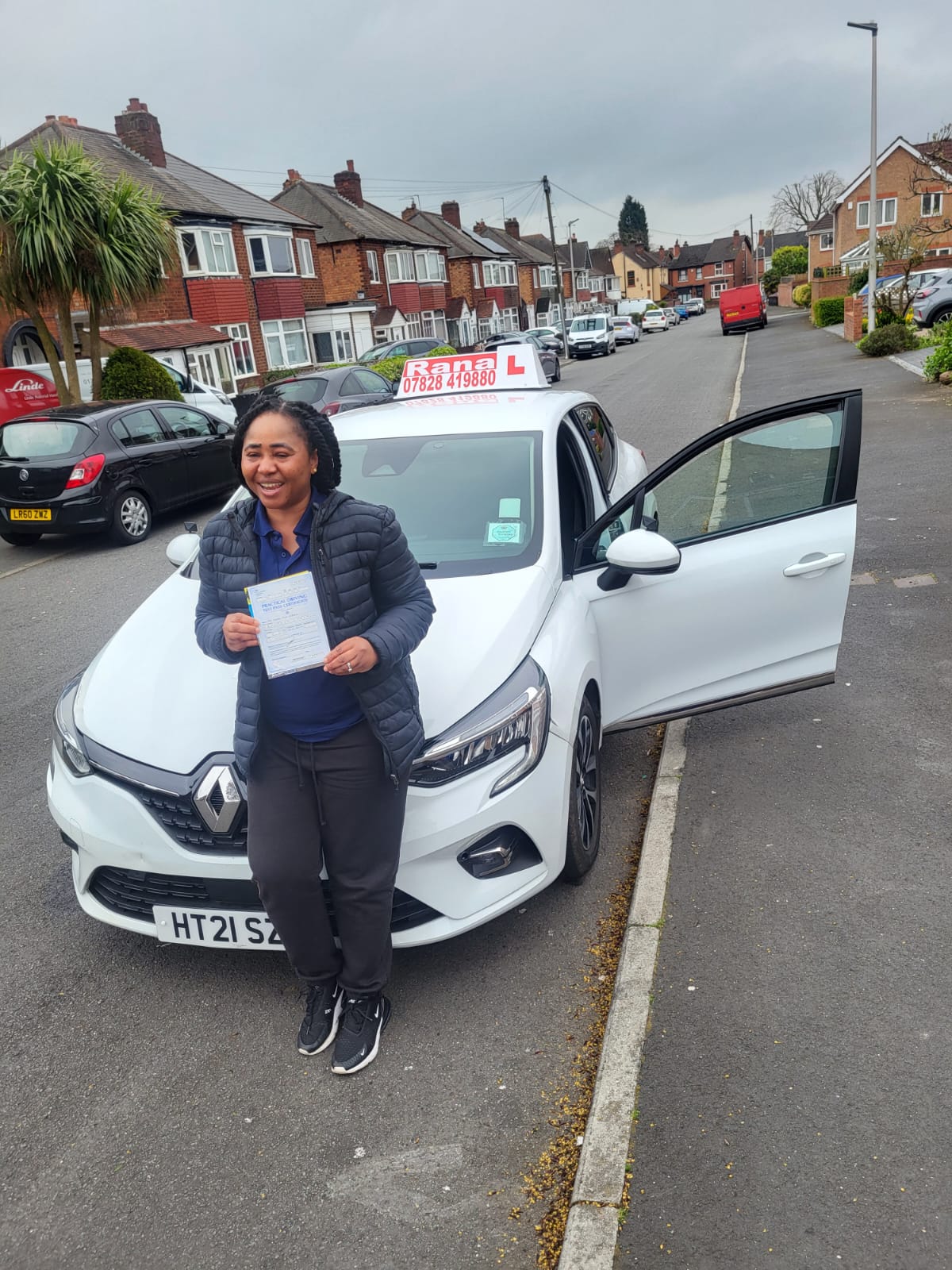 Successful student with driving pass certificate