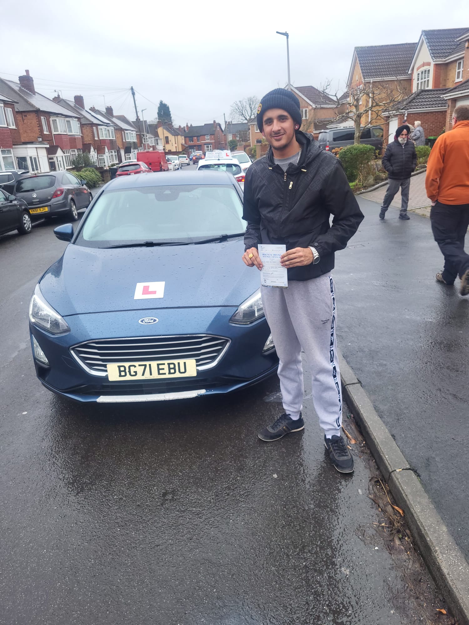 Successful student with driving pass certificate